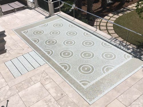 TWINSCAPES Movable floor transforms pool to dry deck, creating two spaces in one on a Beachfront Home